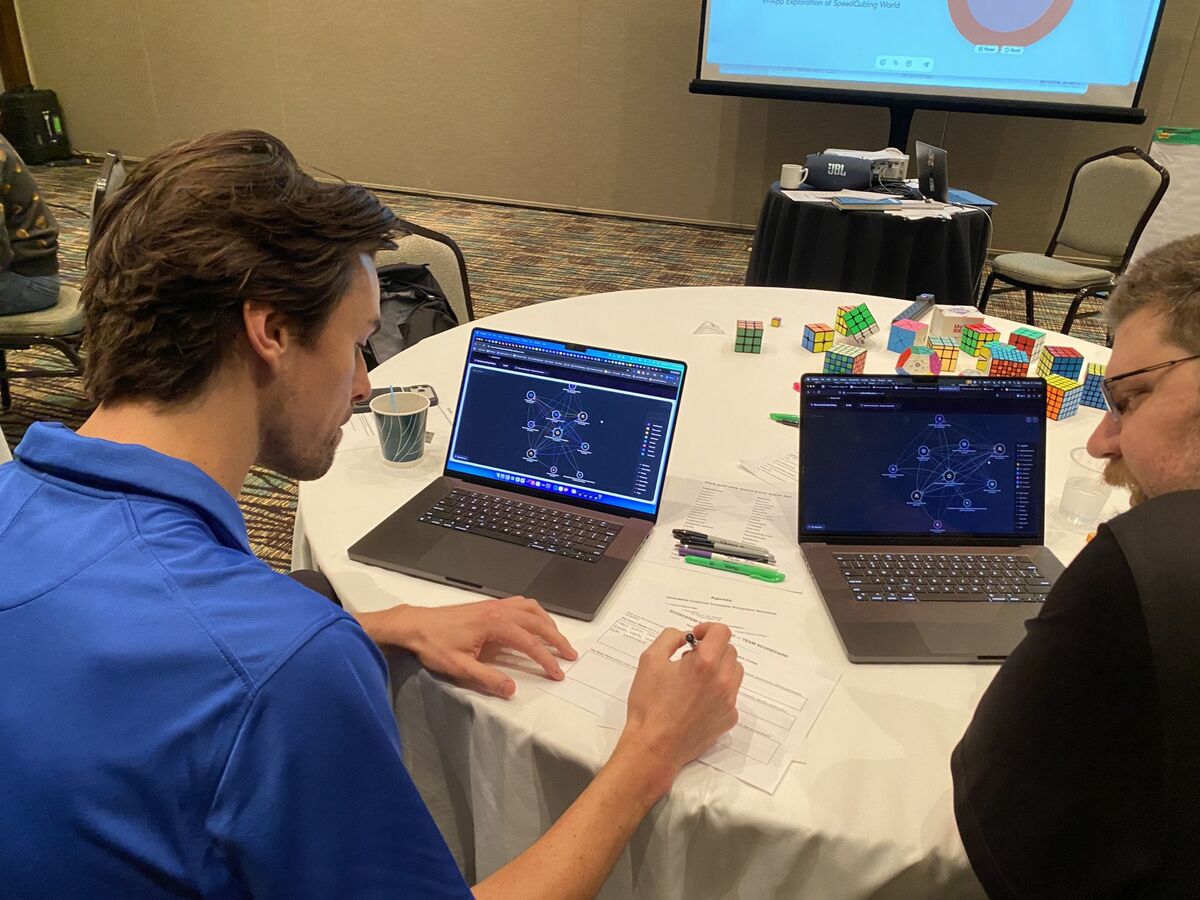 Participants working with network visualization tools during Value Network Game session